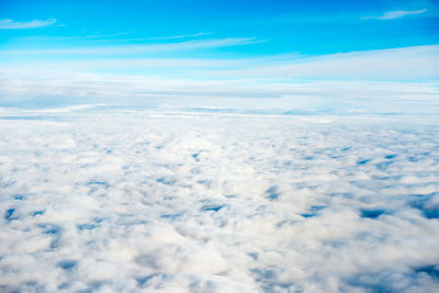 Aerial view of cloudscape against blue sky