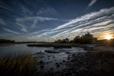 Scenic view of sea against sky during sunset