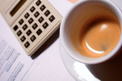 High angle view of coffee cup on table