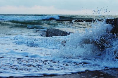 Waves splashing on rocks