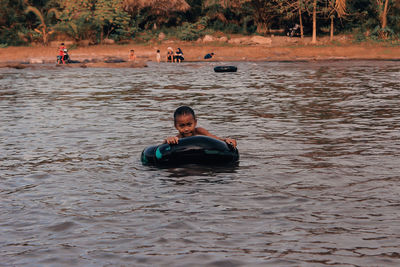 Portrait of man swimming in water