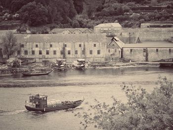 High angle view of boats moored in river