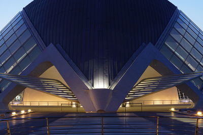 Low angle view of illuminated bridge against sky