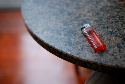 High angle view of cigarette lighter on table