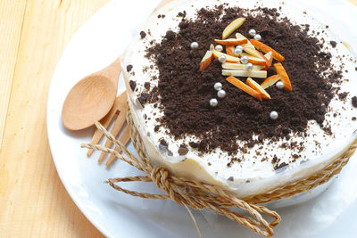 High angle view of cake on wooden table