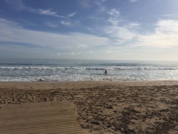 Scenic view of beach against sky