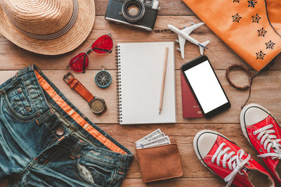 High angle view of personal accessories on table