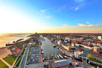 High angle view of cityscape against sky during sunset