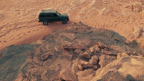 High angle view of tire on sand at desert