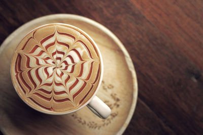 High angle view of cappuccino on table