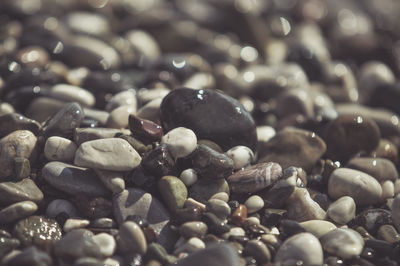 Full frame shot of wet pebbles