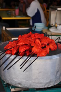 Close-up of red chili peppers for sale in market