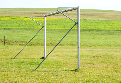 Field seen through chainlink fence