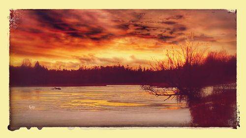 Scenic view of lake during sunset