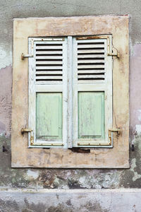 Closed window of old building
