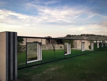 Built structure against sky during sunset