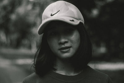 Close-up portrait of a smiling young woman