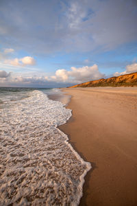 Scenic view of beach against sky