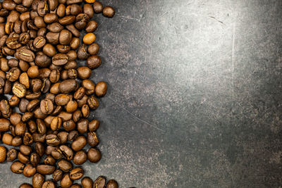 High angle view of roasted coffee beans on table