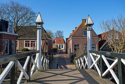 Medieval bridge and houses in the city hindeloopen in the netherlands