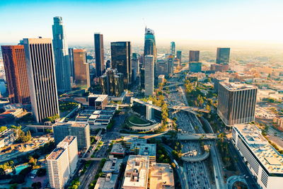 High angle view of buildings in city against sky