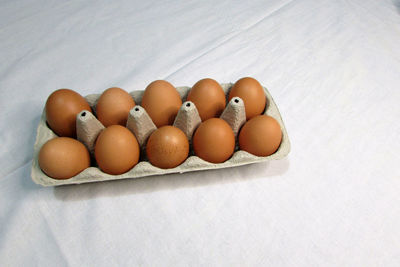 High angle view of eggs in container