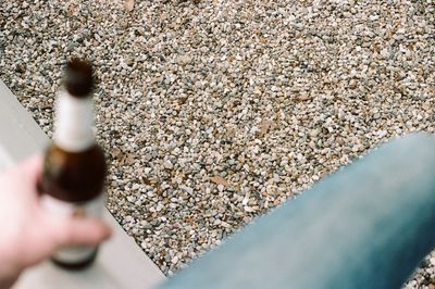 Close-up of hand holding umbrella