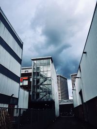 Low angle view of skyscraper against sky