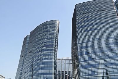 Low angle view of skyscrapers against sky