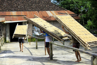 Feb 2, 2015. the workers after drying mie lethek noodles in an open traditional factory area.