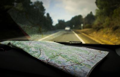 Cropped image of car on road