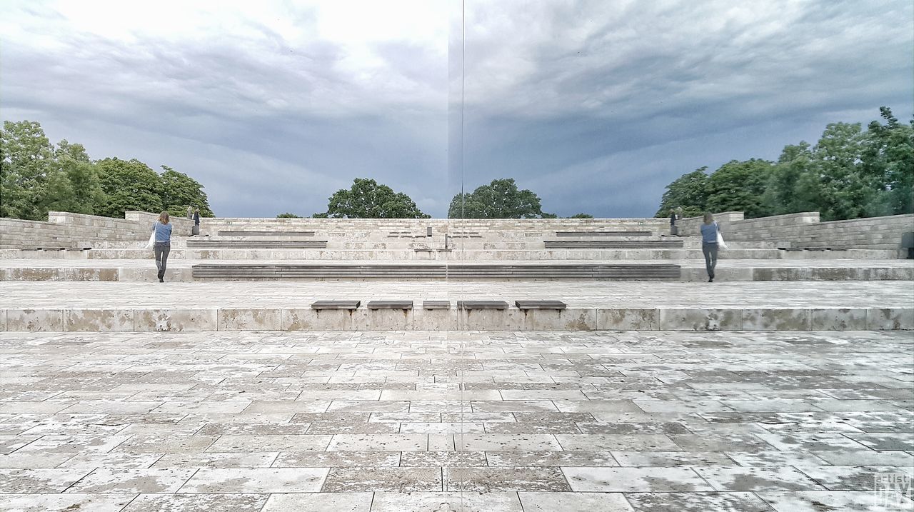 cloud - sky, sky, real people, day, water, tree, built structure, nature, architecture, outdoors, history, travel destinations, architectural column, men, scenics, beauty in nature, one person, ancient civilization, people