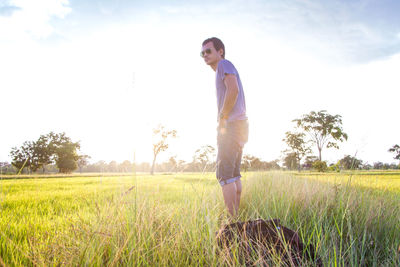 Full length of man on field against sky