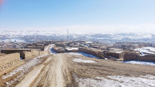 Aerial view of townscape against clear sky