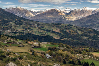 High angle view of trees and mountains against sky