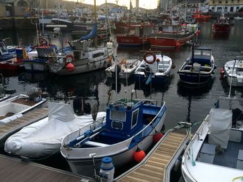 High angle view of boats moored at harbor