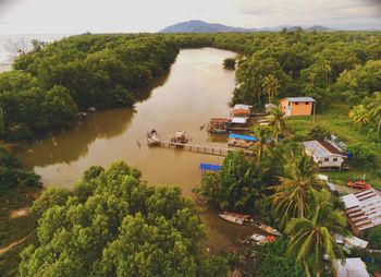 High angle view of trees and buildings against sky