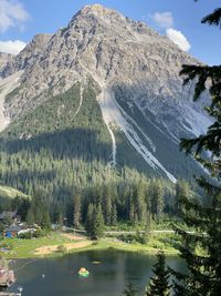 Scenic view of snowcapped mountains and lake