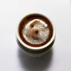 Close-up of coffee cup on table
