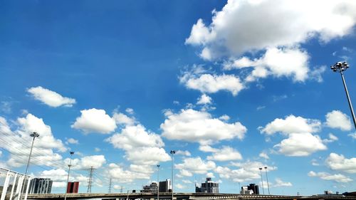 Low angle view of buildings against blue sky