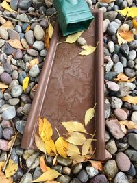High angle view of stones on pebbles