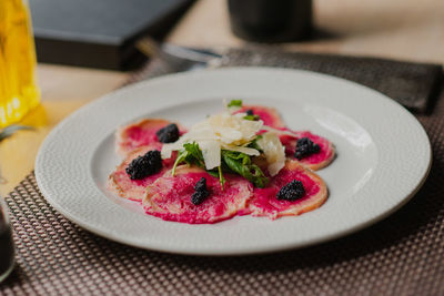 Close-up of food in plate on table