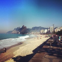 Scenic view of beach against clear sky