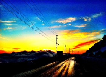 Electricity pylon at sunset