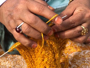 Close-up of woman knitting wool