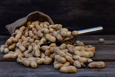 Close-up of roasted coffee beans on table