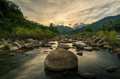 Scenic view of mountains against sky during sunset