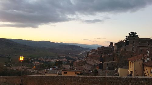 High angle view of townscape against sky at sunset