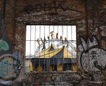 Low angle view of graffiti on building wall