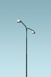 Low angle view of street light against clear sky